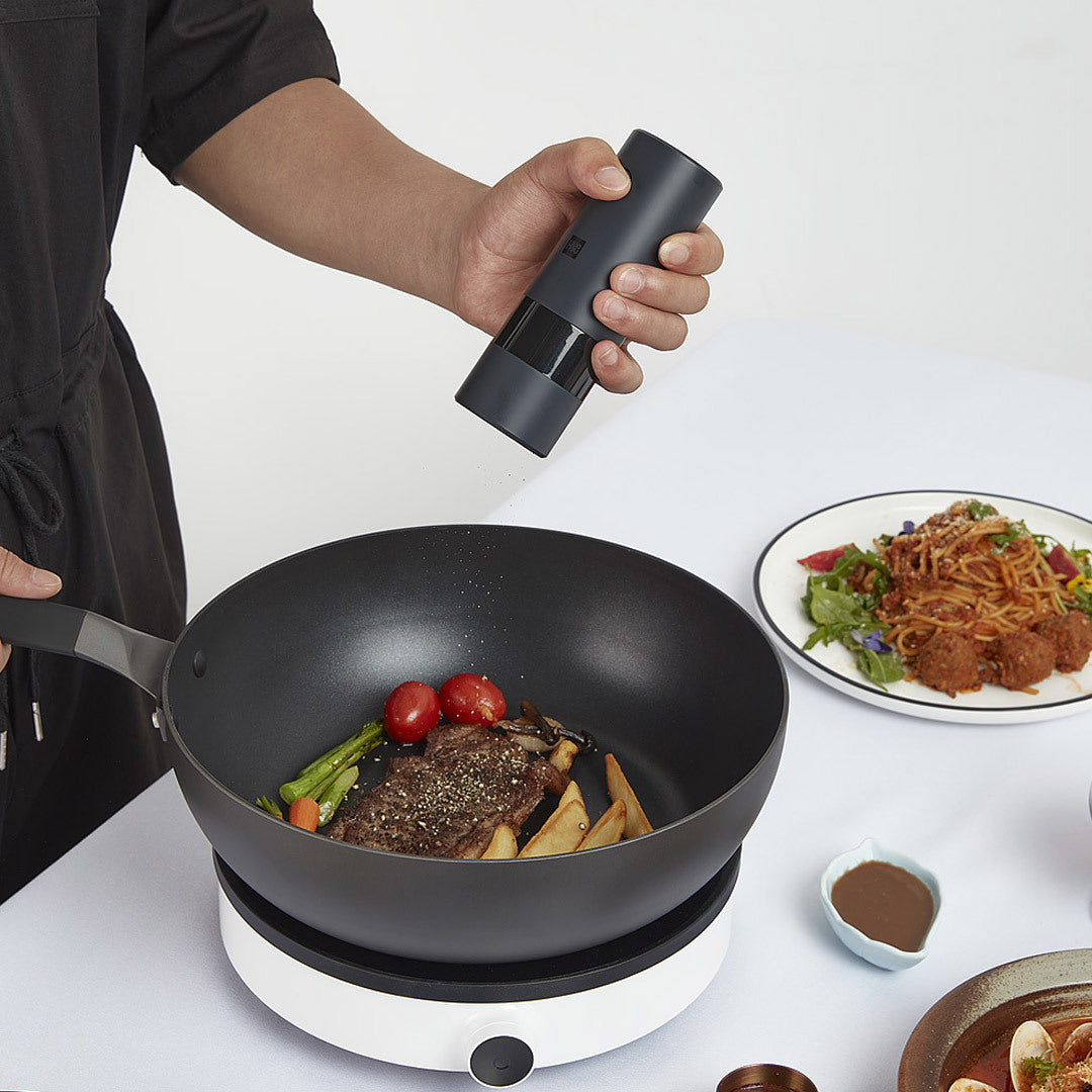 Electric Salt & Pepper Mill set on kitchen counter ready for seasoning