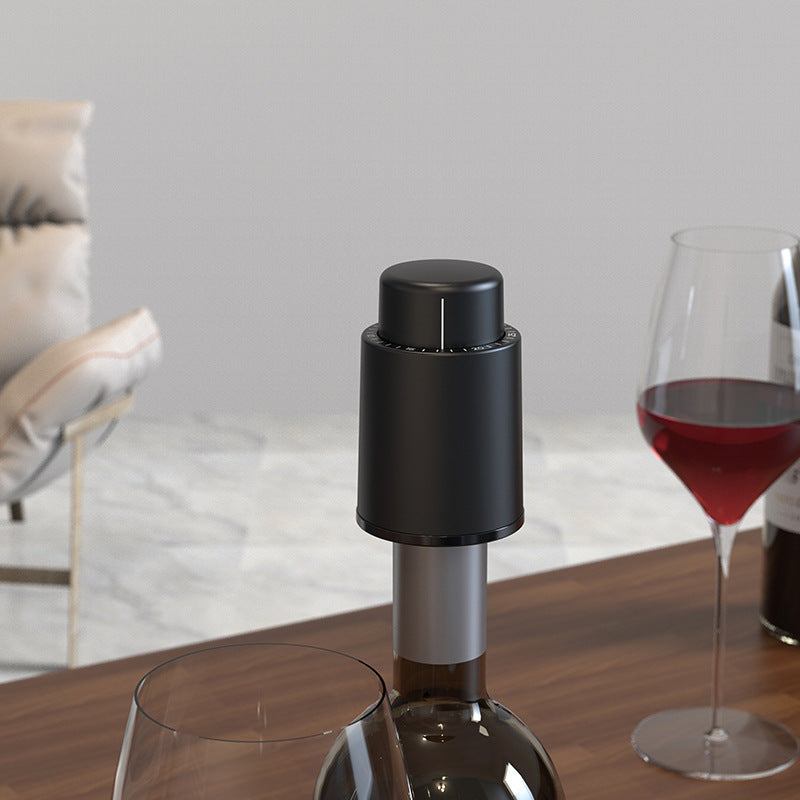 Sleek electric wine bottle opener on a kitchen counter