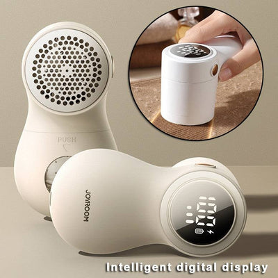 Close-up of Digital Fabric Lint Remover in use on cotton fabric